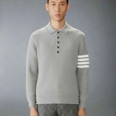TB 톰브라운 사선 케이블 카라 니트