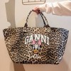 GN 가니 X 디즈니의 콜라보레이션 데이지덕 레오파드 토트백